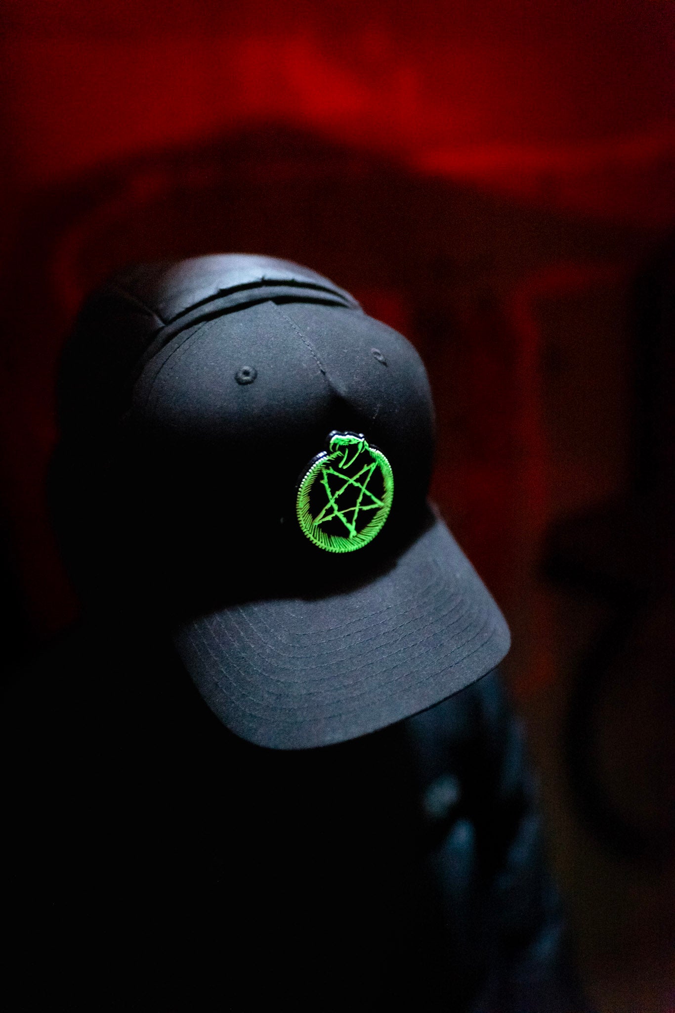 Front view of the Dark Matter Threads Void Marker unisex snapback hat with glow-in-the-dark design.