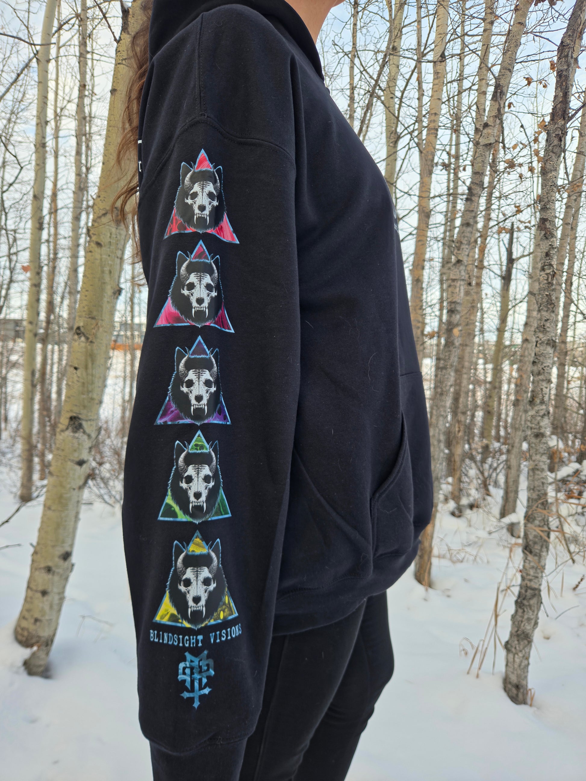 Female model wearing the Dark Matter Threads black unisex Decide graphic hoodie, side view sleeve design, streetwear fit.